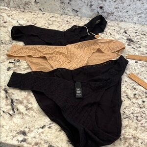 Skims set of 3 bikini Black and Tan Lace Panty Set